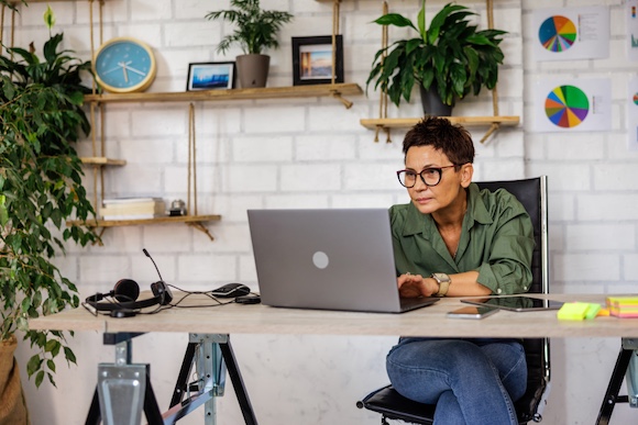 Nutritionist watching laptop screen