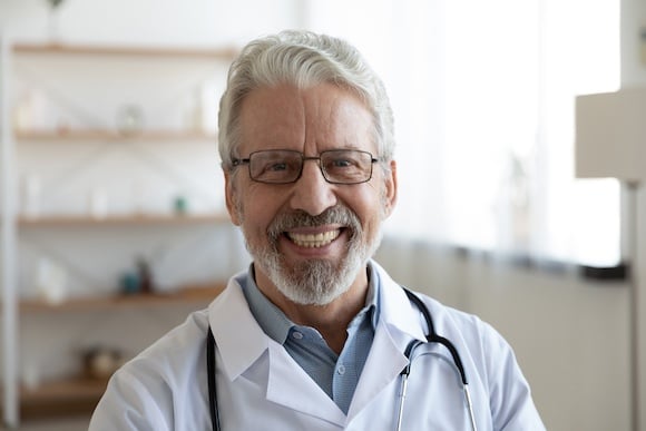 Male doctor facing the camera